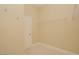 Walk-in closet featuring white walls, neutral carpeting and white, wire shelving at 36 Hunt Valley Trl, Henderson, NV 89052