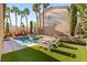 Backyard oasis with pool, spa, pergola, and lounge chairs at 3801 Terrace Grove St, Las Vegas, NV 89129