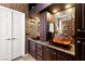 Luxurious bathroom with double vanities and mosaic tile at 3801 Terrace Grove St, Las Vegas, NV 89129