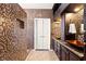 Bathroom features a walk-in shower with mosaic tile and granite at 3801 Terrace Grove St, Las Vegas, NV 89129