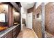 Spa-like bathroom with walk-in shower and large vanity at 3801 Terrace Grove St, Las Vegas, NV 89129