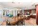 Kitchen dining area with wood table and access to backyard at 3801 Terrace Grove St, Las Vegas, NV 89129