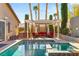 Relaxing pool area with pergola, seating, and spa at 3801 Terrace Grove St, Las Vegas, NV 89129