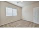 Spacious bedroom with window and neutral wall at 4039 Welsh Pony St, Las Vegas, NV 89122