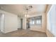 Bright dining room with tile floors and kitchen access at 4039 Welsh Pony St, Las Vegas, NV 89122