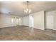 Open dining room with tile floors and access to other rooms at 4039 Welsh Pony St, Las Vegas, NV 89122