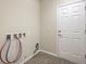 Laundry room with hookups and tile flooring at 4039 Welsh Pony St, Las Vegas, NV 89122