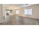 Spacious living room with tiled floors and views of the kitchen at 4039 Welsh Pony St, Las Vegas, NV 89122