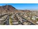 Beautiful aerial view of a residential neighborhood with stunning mountain views at 41 Voltaire Ave, Henderson, NV 89002