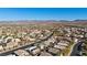 Scenic aerial view of a residential neighborhood, showcasing the community layout with mountain range backdrop at 41 Voltaire Ave, Henderson, NV 89002