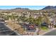 Aerial view of the community featuring a park and playground with mountain views at 41 Voltaire Ave, Henderson, NV 89002