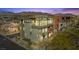 Modern townhome at dusk with mountain views at 4141 Sunrise Flats St, Las Vegas, NV 89135