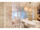 Spa-like bathroom with marble tile and a soaking tub at 4381 W Flamingo Rd # 1909, Las Vegas, NV 89103