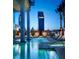 Luxury resort-style pool and spa with comfortable lounge chairs at 4381 W Flamingo Rd # 1909, Las Vegas, NV 89103