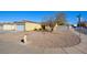 House exterior view with a rock landscaping and a fire hydrant at 451 Wright Way, Henderson, NV 89015