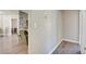 Clean hallway with light walls and wood-look flooring at 451 Wright Way, Henderson, NV 89015