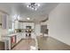 Modern kitchen with white cabinets and stainless steel appliances at 451 Wright Way, Henderson, NV 89015