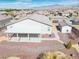 Aerial view of a home featuring a covered patio and gravel landscaping in the backyard at 4641 Sommerset Ct, Pahrump, NV 89061