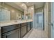 Bathroom featuring dual sinks, quartz countertops, sleek cabinetry, and tile flooring at 4641 Sommerset Ct, Pahrump, NV 89061