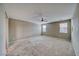 Spacious bedroom featuring neutral carpet and ceiling fan at 4641 Sommerset Ct, Pahrump, NV 89061