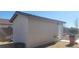 Large storage shed in the backyard with a brown roof at 4641 Sommerset Ct, Pahrump, NV 89061