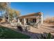 Relaxing backyard oasis with covered patio and hot tub at 493 Lace Haven Ct, Henderson, NV 89012