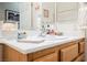 Clean bathroom sink vanity with wood cabinets and chrome fixtures at 493 Lace Haven Ct, Henderson, NV 89012