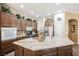 Spacious kitchen with granite island and stainless steel appliances at 493 Lace Haven Ct, Henderson, NV 89012