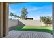 Private backyard with artificial turf and a wooden deck at 5089 Sagelyn St, Las Vegas, NV 89122