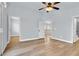 Spacious bedroom with light gray walls and hardwood floors at 5089 Sagelyn St, Las Vegas, NV 89122