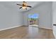 Main bedroom with balcony access and ceiling fan at 5089 Sagelyn St, Las Vegas, NV 89122