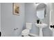 Modern powder room with pedestal sink and updated toilet at 5089 Sagelyn St, Las Vegas, NV 89122