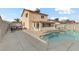 Backyard oasis with a swimming pool and sunroom at 513 Chandler St, Henderson, NV 89014