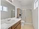 Bathroom with walk-in shower, vanity, and tiled floor at 513 Chandler St, Henderson, NV 89014