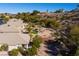 Single-story house with backyard and desert landscape, aerial view at 526 Highland View Ct, Mesquite, NV 89027