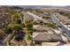 Stunning aerial view of a desert community nestled amongst scenic landscaping and mountain views at 526 Highland View Ct, Mesquite, NV 89027