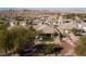 Picturesque aerial view of desert community with landscaped backyards and mountain views at 526 Highland View Ct, Mesquite, NV 89027