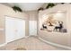 Hallway with tile floors and a decorative alcove with artwork at 526 Highland View Ct, Mesquite, NV 89027