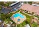 Aerial view of community pool, building, and parking at 5751 E Hacienda Ave # 244, Las Vegas, NV 89122