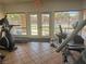 Community fitness center with cardio equipment and pool view at 5751 E Hacienda Ave # 244, Las Vegas, NV 89122