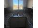 Double sink in updated kitchen with granite counters at 5751 E Hacienda Ave # 244, Las Vegas, NV 89122