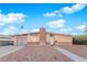 Ranch style home with brick facade and attached garage at 6205 Hargrove Ave, Las Vegas, NV 89107