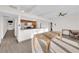 Kitchen with island, stainless steel appliances, and dining area at 6205 Hargrove Ave, Las Vegas, NV 89107