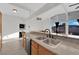 Modern kitchen with stainless steel appliances and wood cabinets at 6205 Hargrove Ave, Las Vegas, NV 89107