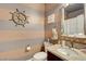 Bathroom with granite vanity and nautical-themed decor at 651 Penshaw Bridge Ave, Las Vegas, NV 89178