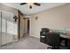 Well-lit bedroom featuring a built-in workspace at 651 Penshaw Bridge Ave, Las Vegas, NV 89178