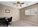 Bright bedroom with a window and workspace at 651 Penshaw Bridge Ave, Las Vegas, NV 89178