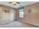 Spacious bedroom with ceiling fan and neutral wall colors at 651 Penshaw Bridge Ave, Las Vegas, NV 89178