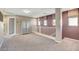 Spacious loft area with neutral carpeting and an open railing at 651 Penshaw Bridge Ave, Las Vegas, NV 89178