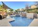 Inviting pool with waterfall feature and spacious patio area at 651 Penshaw Bridge Ave, Las Vegas, NV 89178